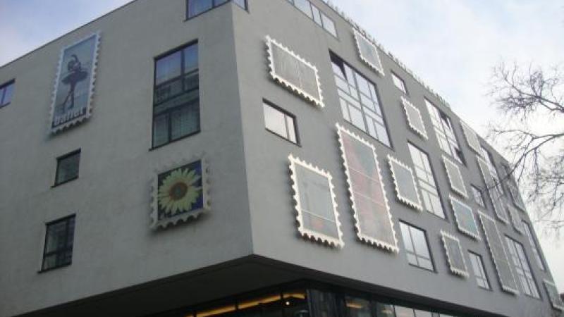 Luxurious modern hotel situated on among the buildings of the old town.